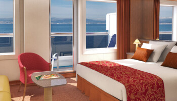 1548635752.5084_c155_Carnival Cruise Lines Carnival Splendor Accommodation Ocean Suite.jpg